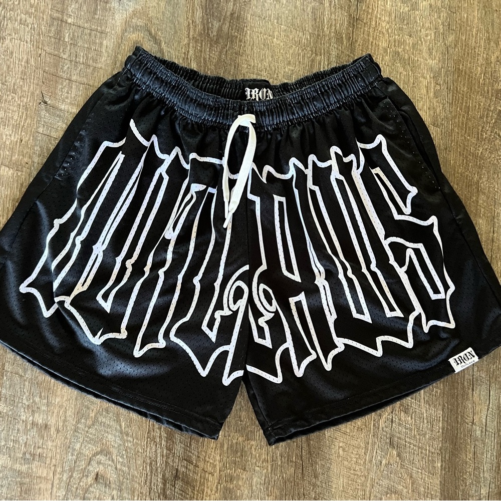 Iron Outlaws Black and White Athletic Shorts with Bold Graphic Print